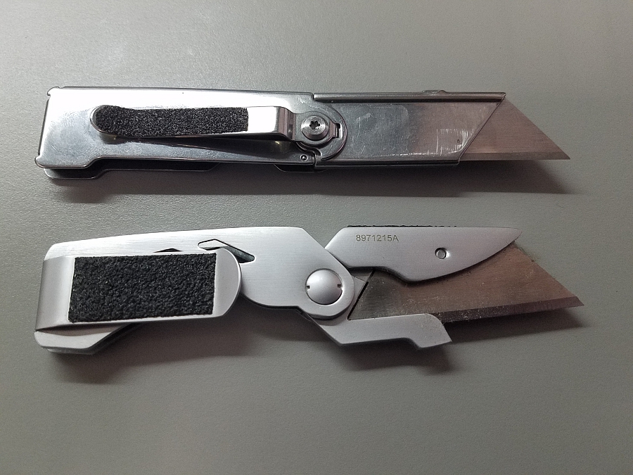 File:Safety cutter and simple box cutter blades extended.jpg